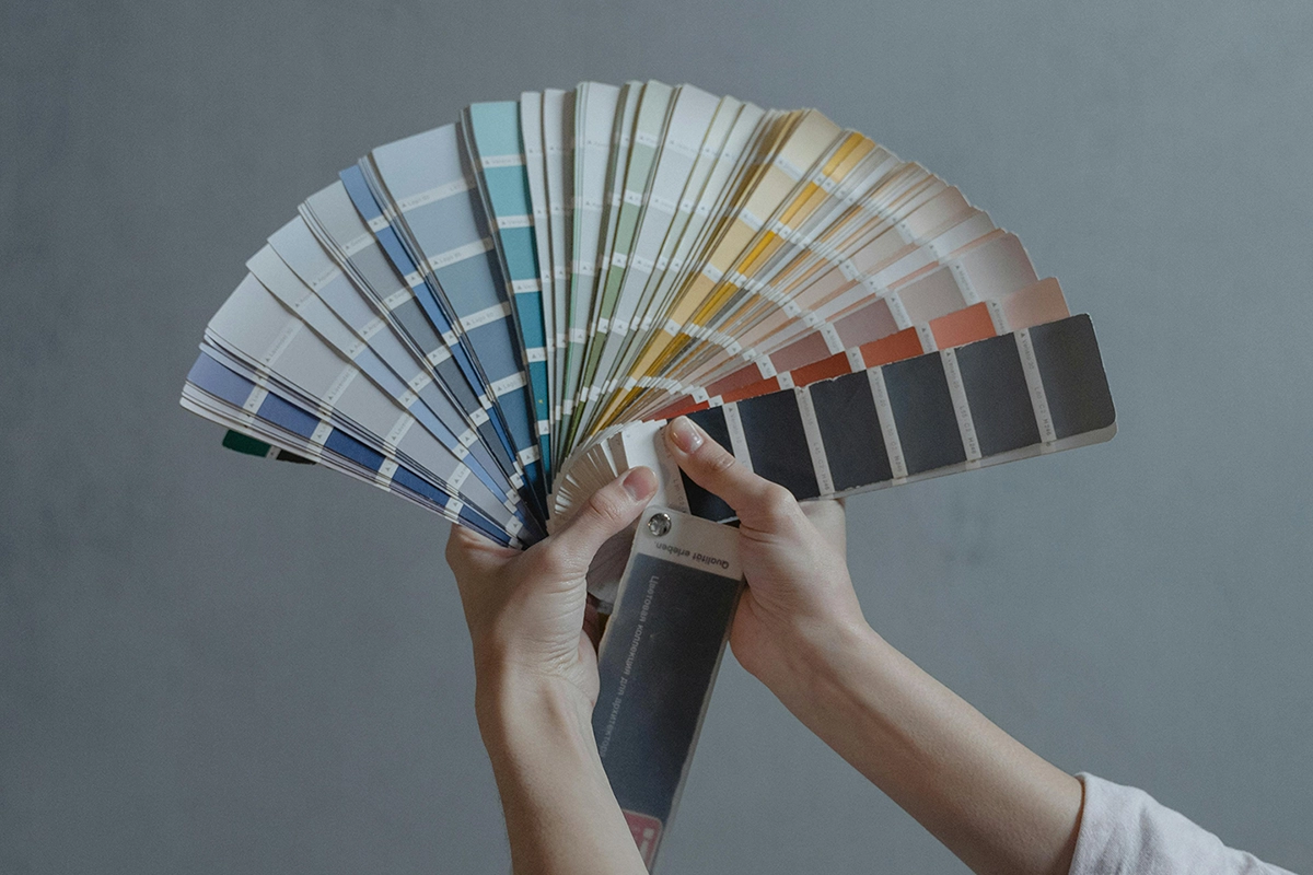 Color palette selection in hand – Home Upgrade Ideas for Campbellford by Renossance