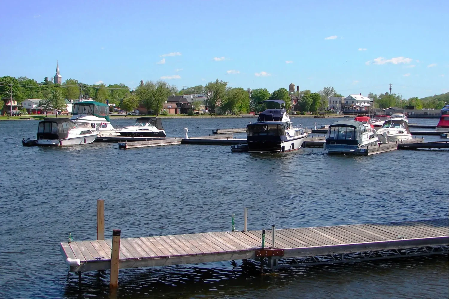 Boats docked at the Trent River marina waterfront in Trent Hills ON – Renossance