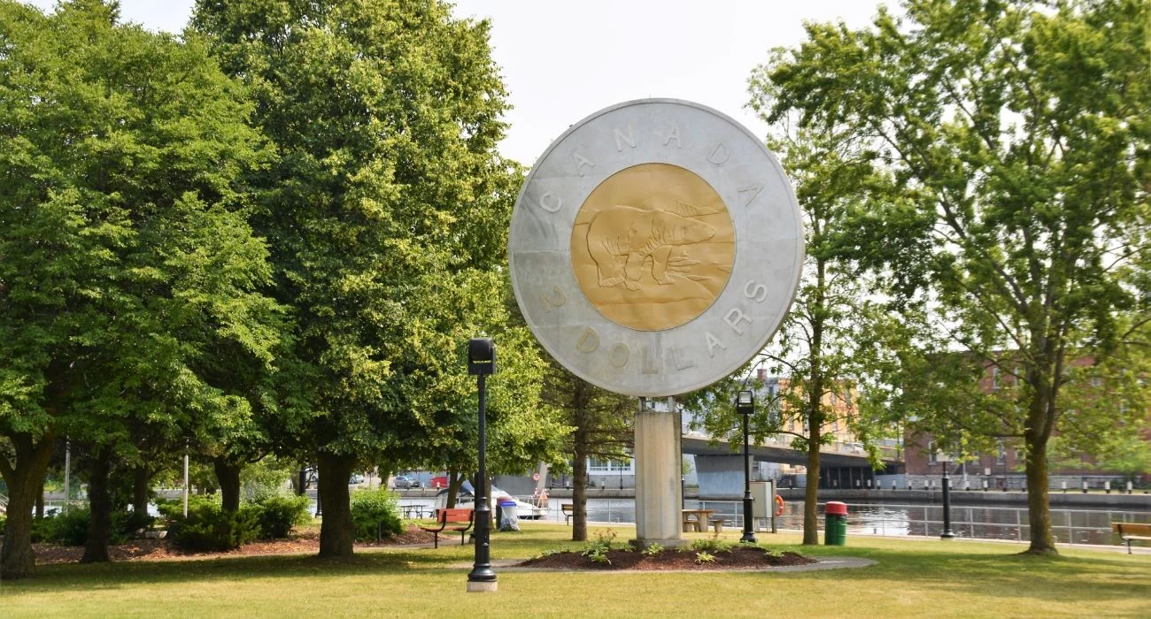 Giant Toonie sculpture beside the Trent River in Campbellford ON – Renossance