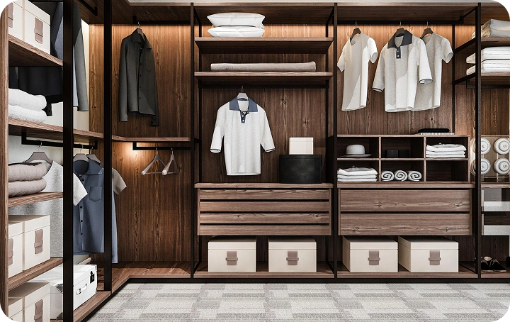 Custom walk-in closet system with wooden shelves, hanging clothes, drawers and storage bins