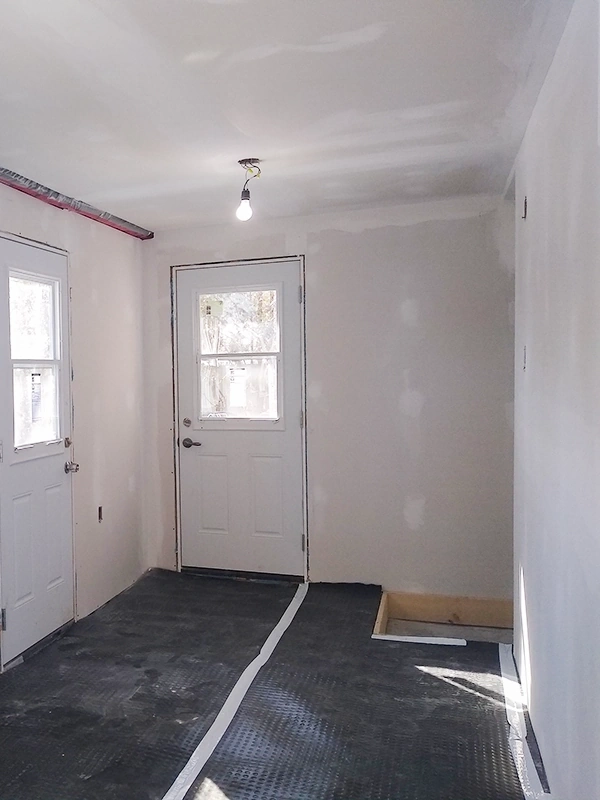 Drywall Repair and Installation Warkworth – hallway drywall repair and ceiling refinishing in progress