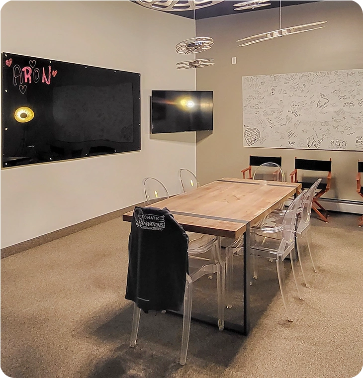 Custom-designed meeting area from basement renovations Madoc by Renossance.