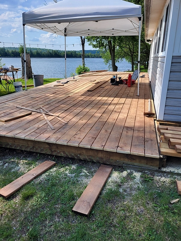 Lakeside wood deck under construction – Deck Repair and Deck Installation Hastings, ON
