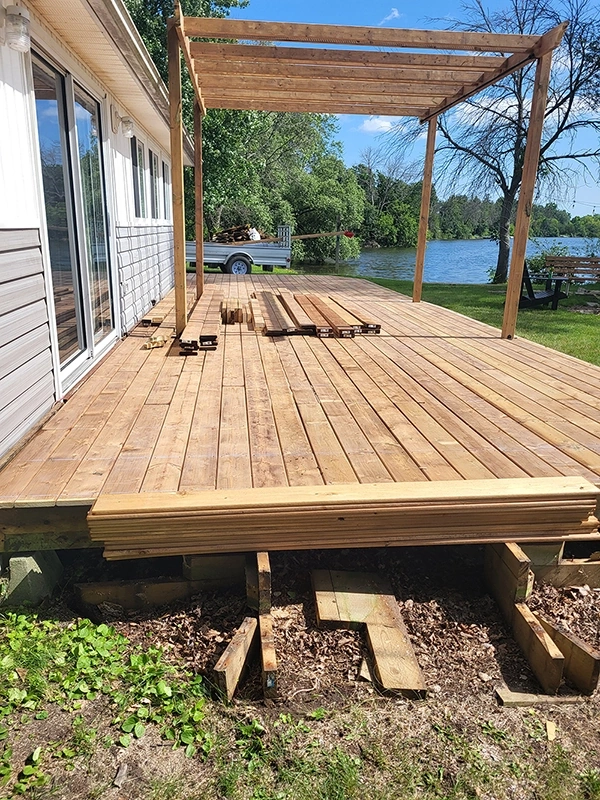 Wooden deck framing during deck repair and deck installation in Norwood, ON