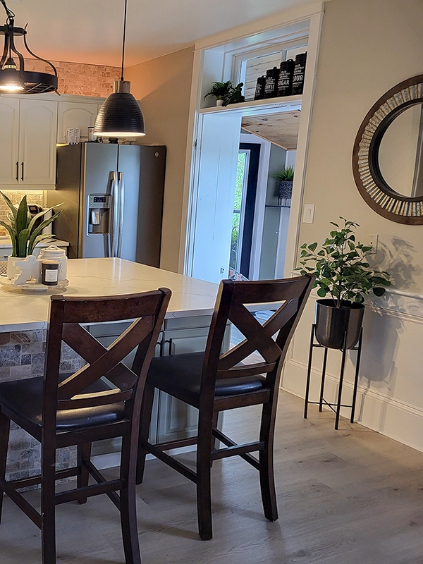 Kitchen island and lighting feature from a kitchen renovations Stirling by Renossance.