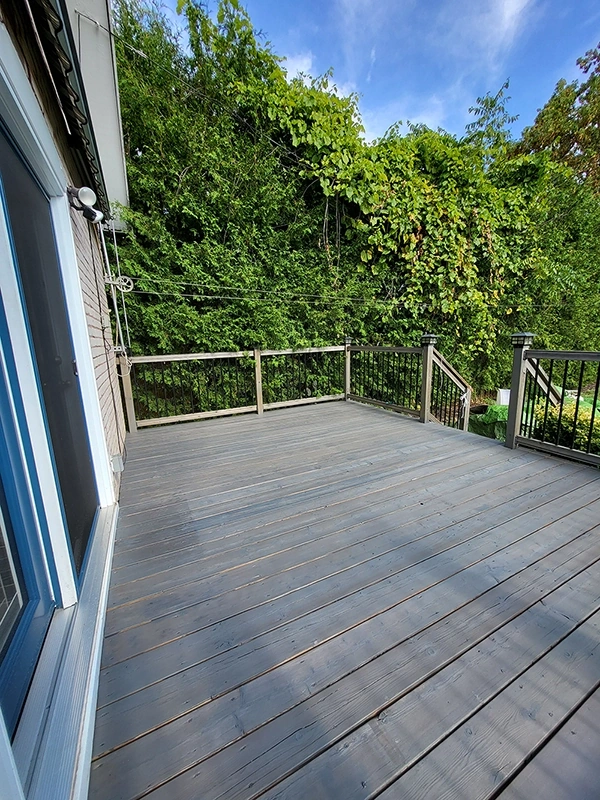 Stained backyard deck with railing – Deck Repair and Deck Installation Trent Hills, ON