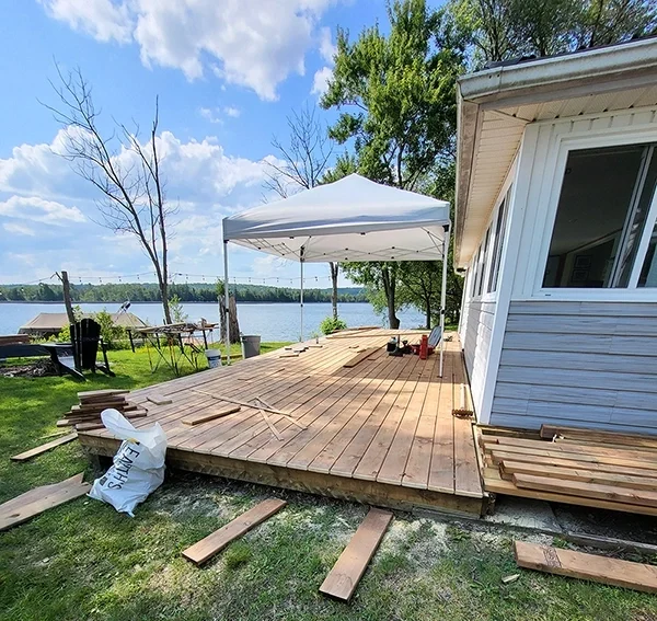 New wooden deck under construction by the lake – Deck Repair and Deck Installation Warkworth, ON
